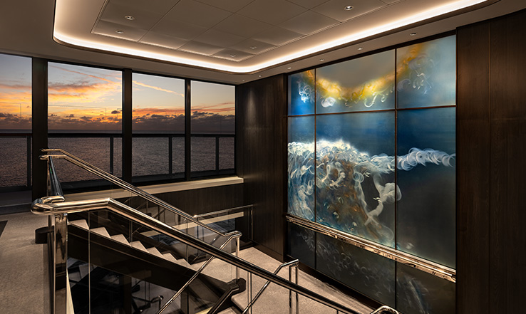 Fleeting Reflections, and Mysterious Sea, Chas Colburn, acrylic panels and film on brushed aluminum. Located on FWD staircase Deck 3 - 10, AFT staircase Deck 3 - 9.