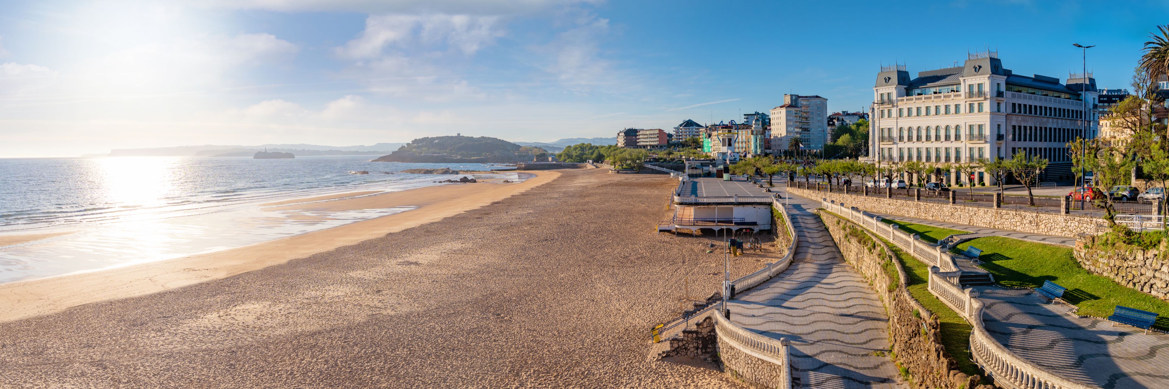 The sun shines on a beach in Santander, Spain