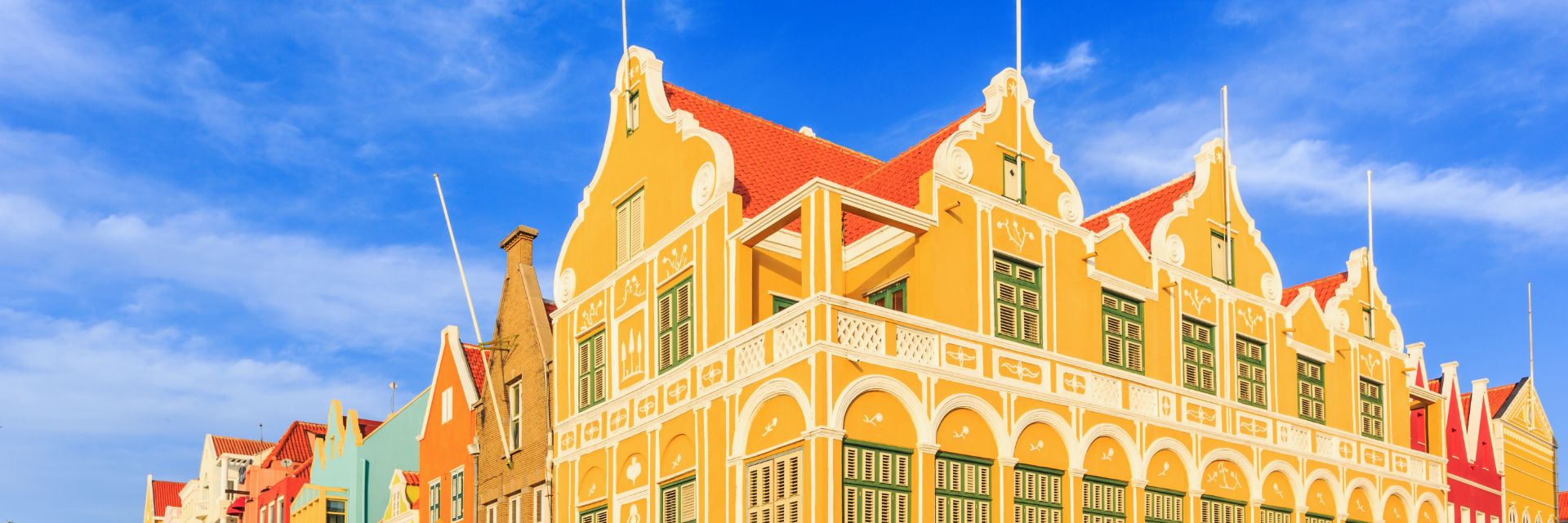 Corner of street with large colorful buildings