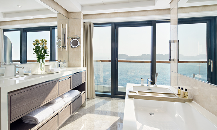 Floor-to-ceiling windows offer stunning vistas from The View Suite bathtub