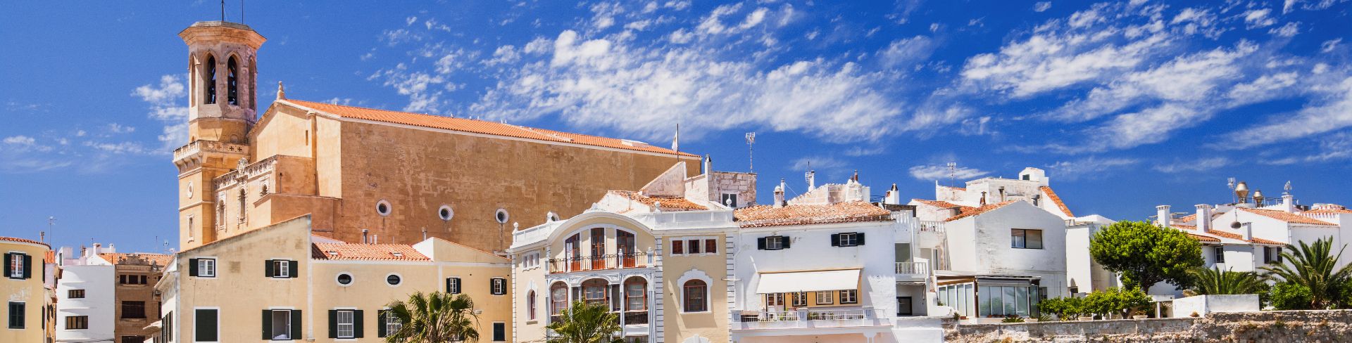 Buildings in  Mahon on a hillside. 