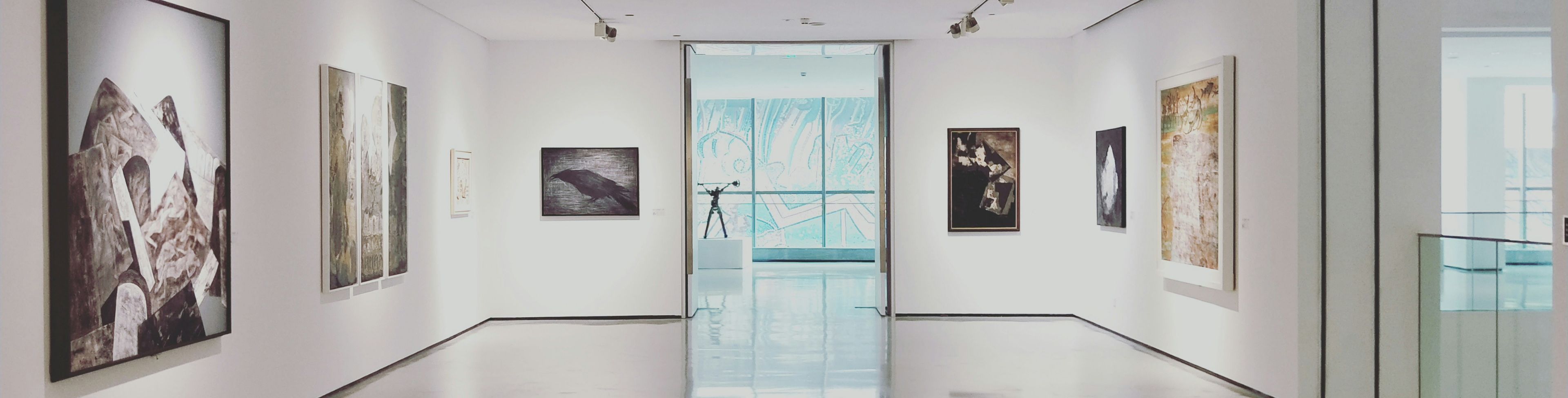 Empty art gallery full of art. 
