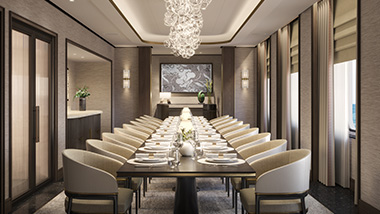 Set table with chairs, plates, and silverwear.