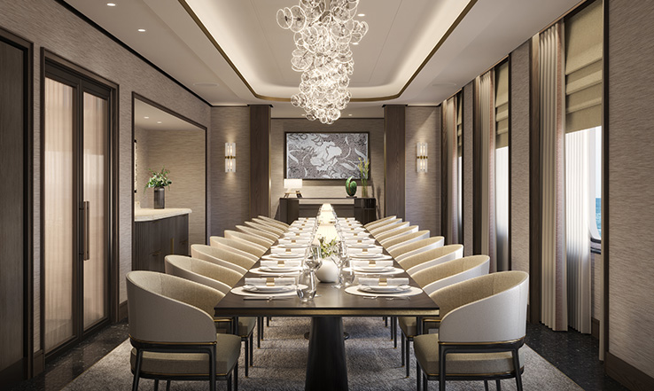Set table with chairs, plates, and silverwear.