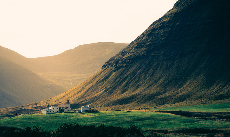 Mountains and fields at sunrise. 