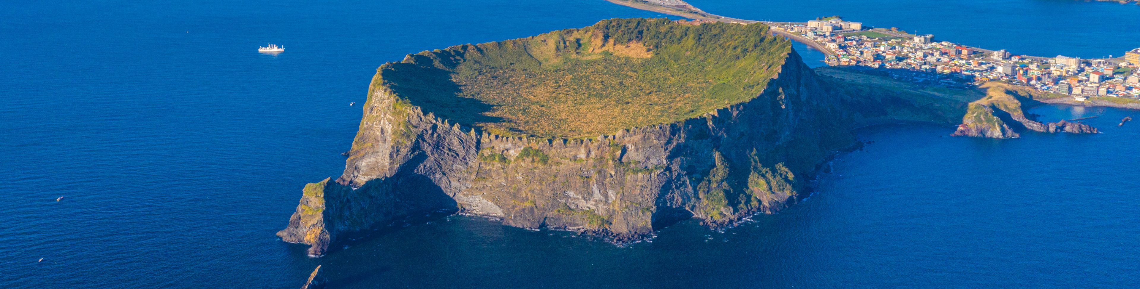 Land surrounded by water. 