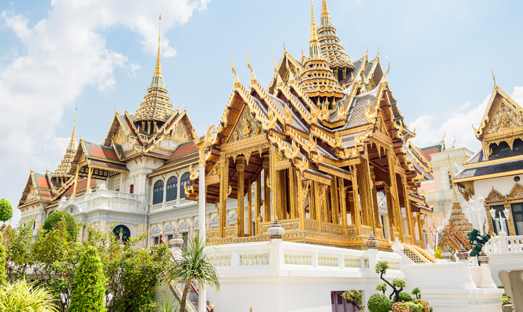 Grand Palace in Bangkok in the distance. 
