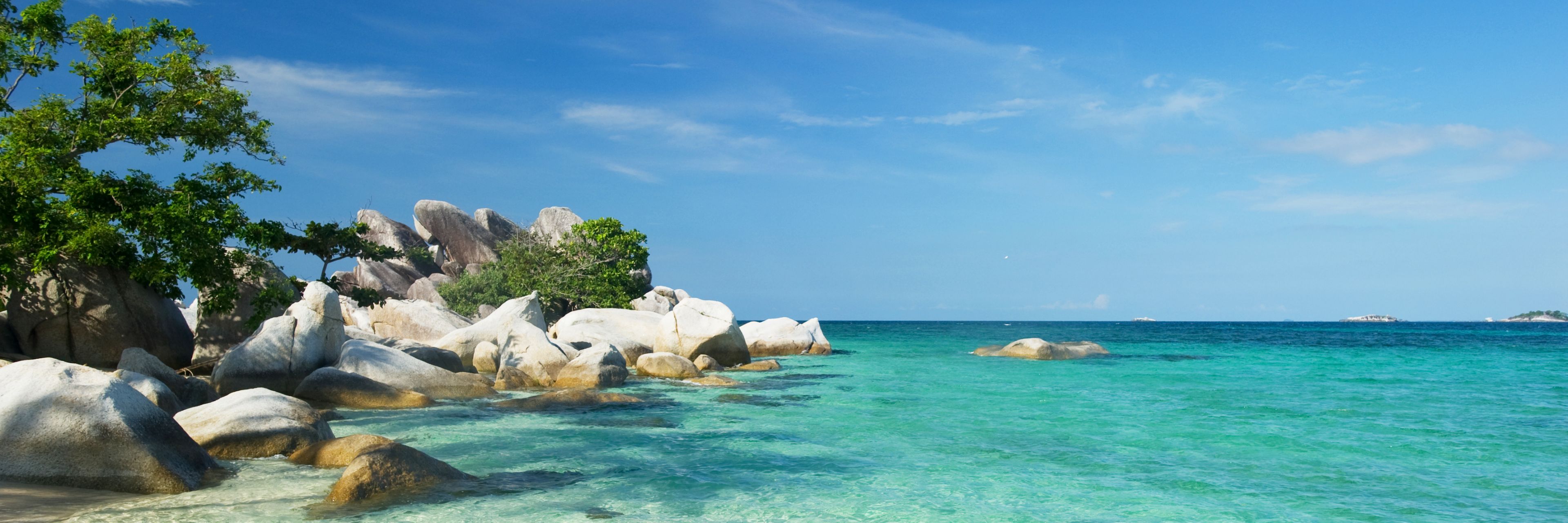 Beach view of blue ocean waters. 