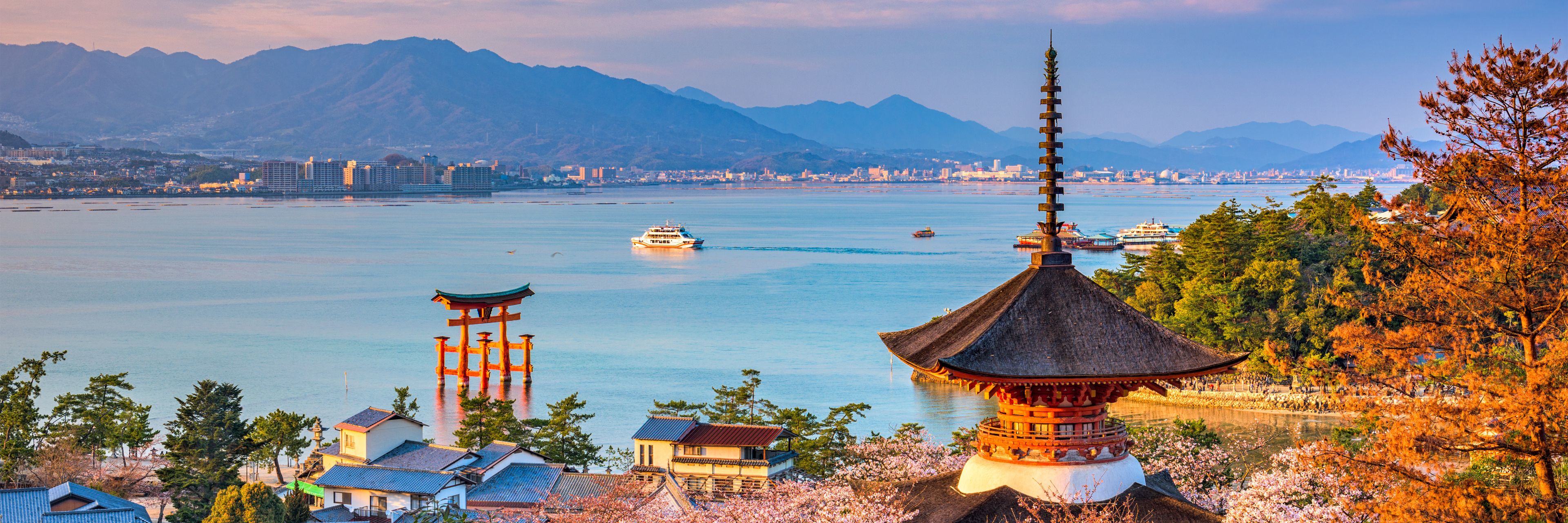 View of some buildings and the ocean in the distance. 