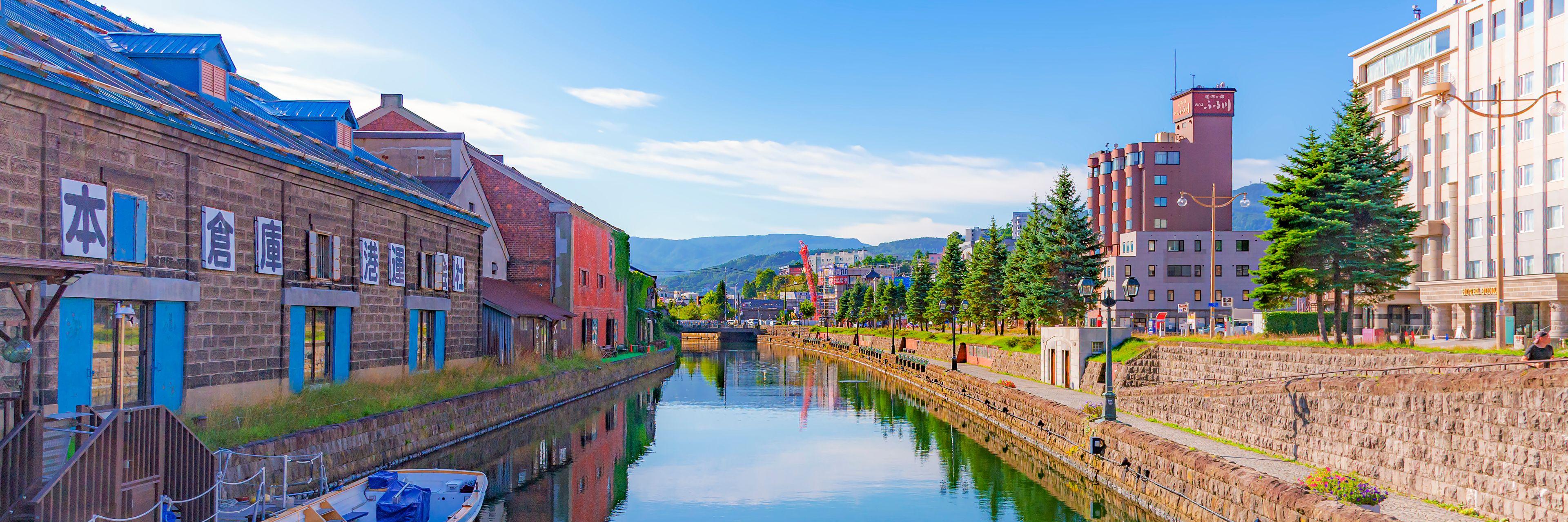 Ravine between two parts of city and buildings. 