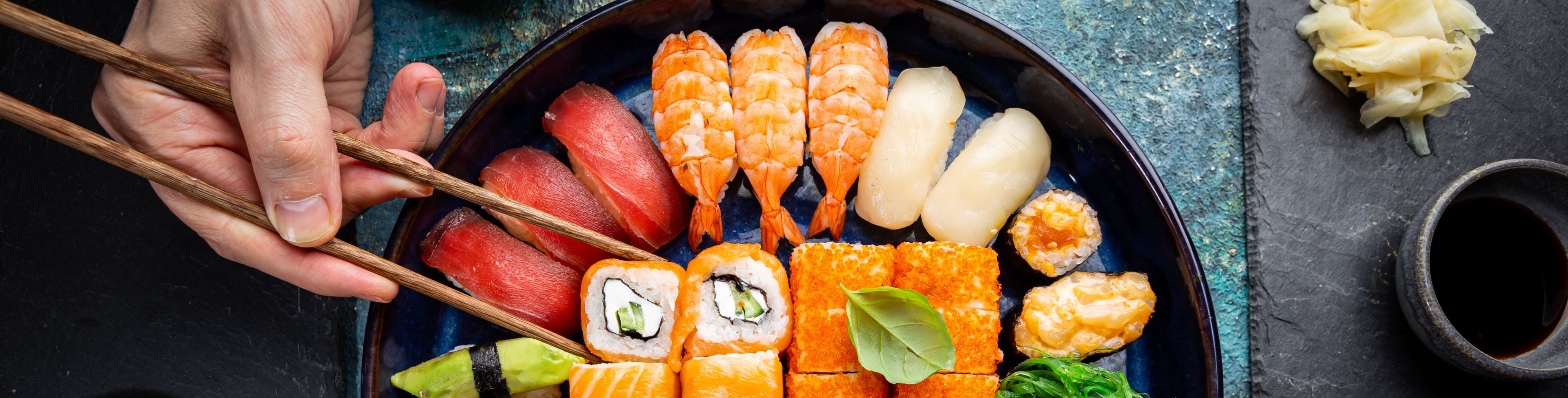 Plate of a variety of sushi. 