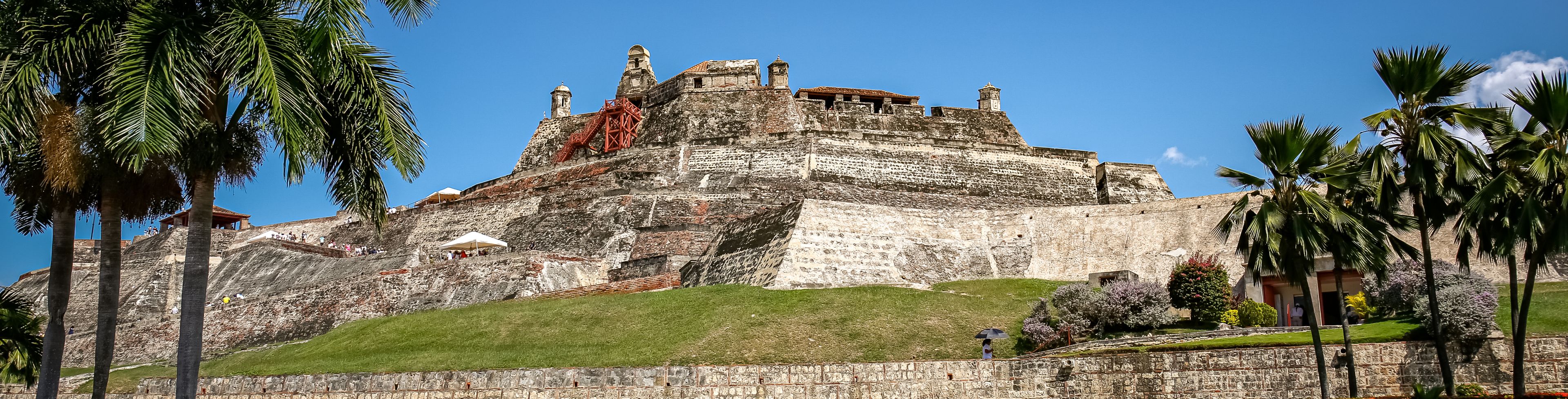 Castle grounds with different levels of green grass. 