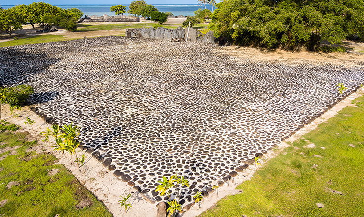 Stones in a large square, surrounded by nature.