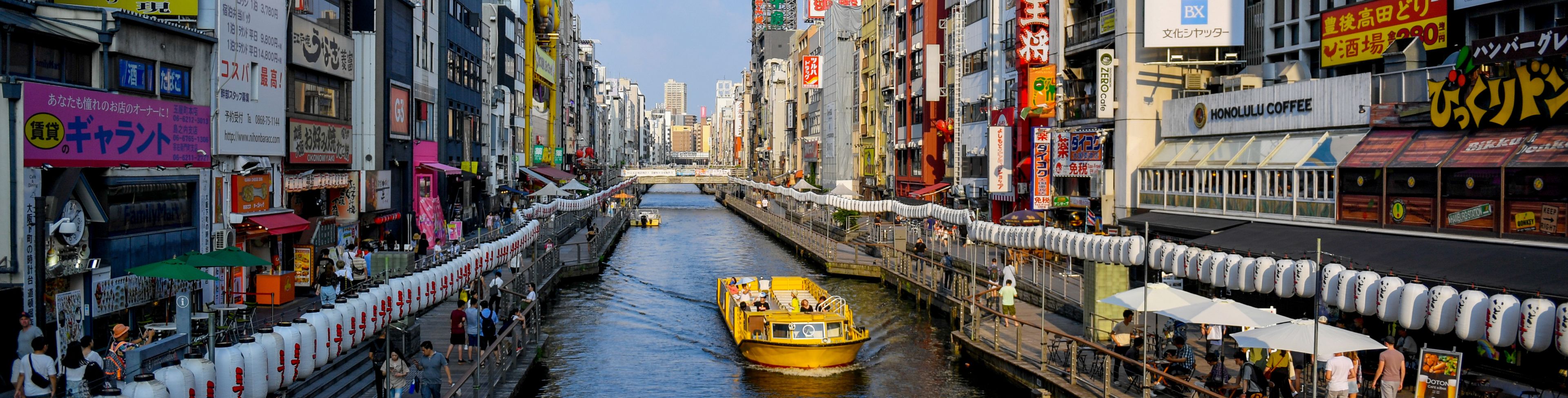 Canal between city buildings. 
