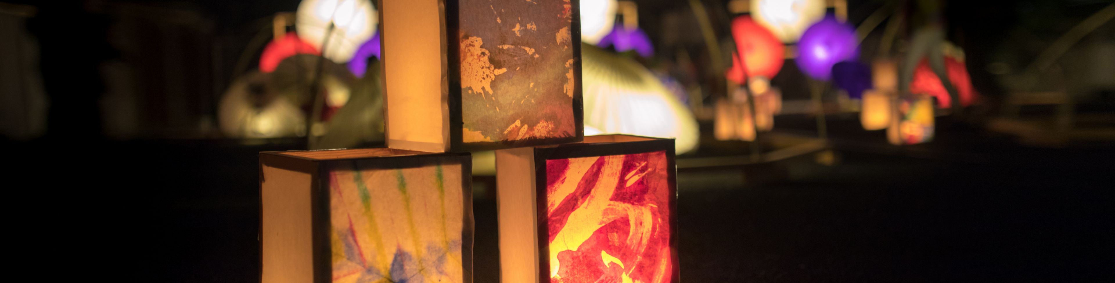 Lanterns glowing in the dark.