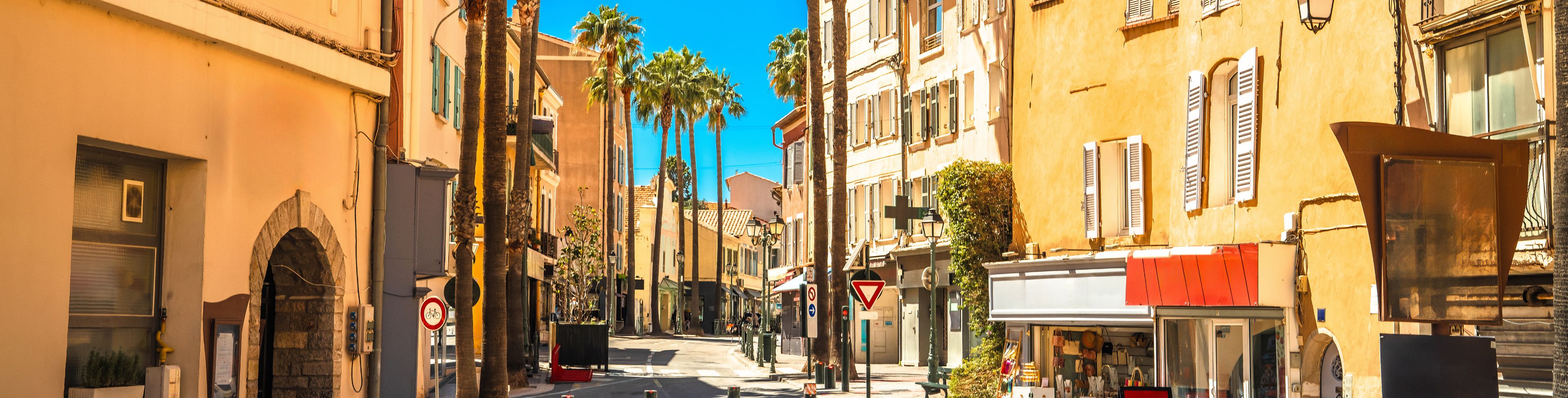 Street between buildings. 