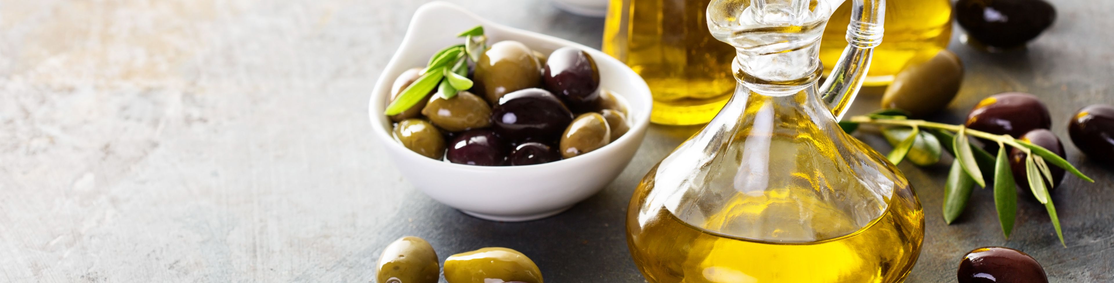 Olive and oils in containers.