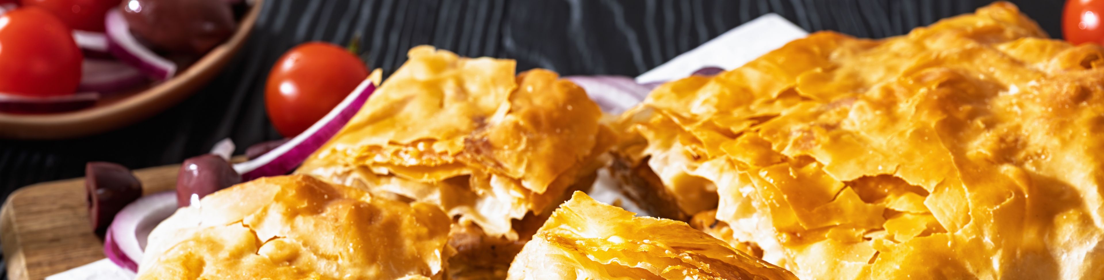 Fresh baked pastry being served on a table. 