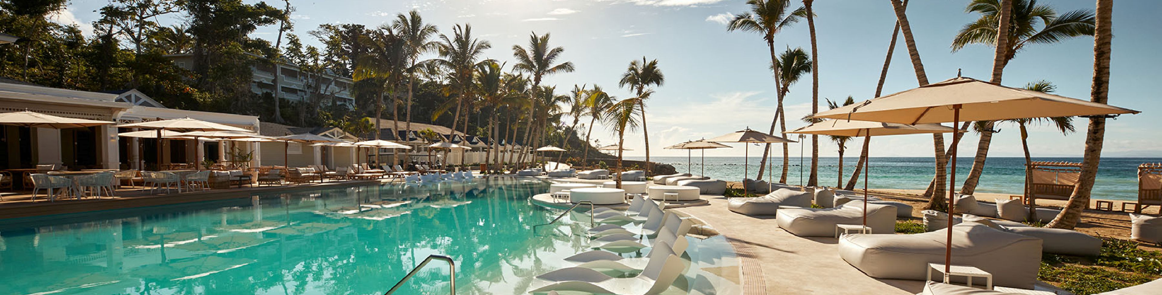 Empty pool and lounge chairs. 