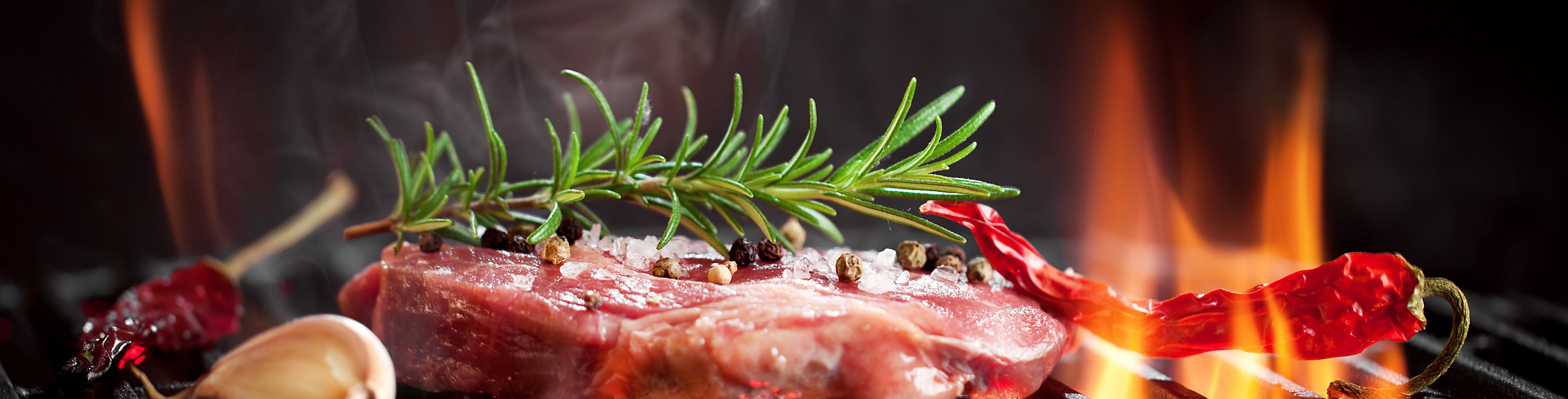 Meat cooking on a grill. 