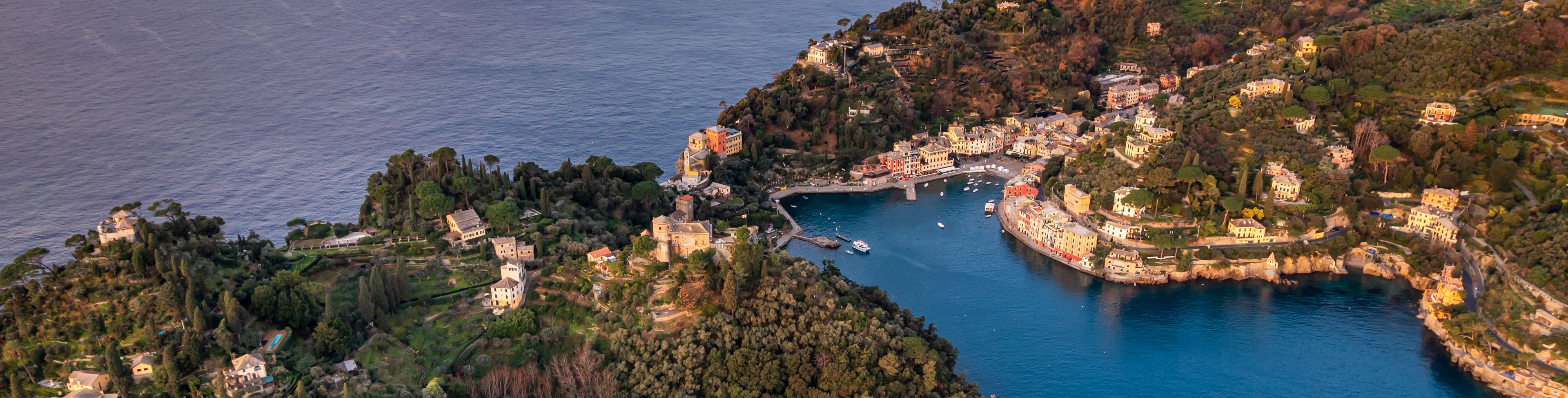 Aerial view of city, nature, and the marina.