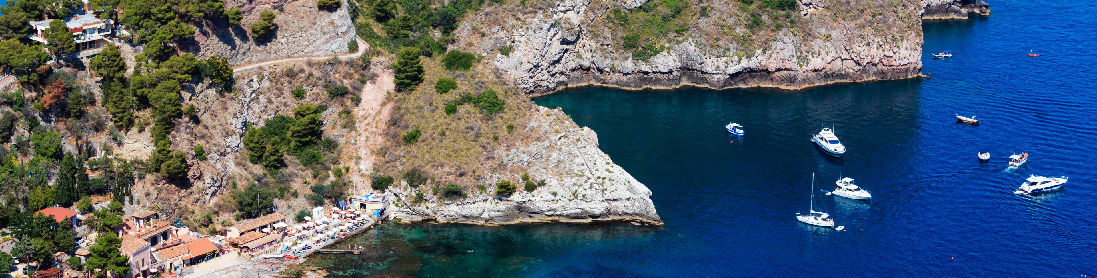 Aerial view of cliffs and the marina below.