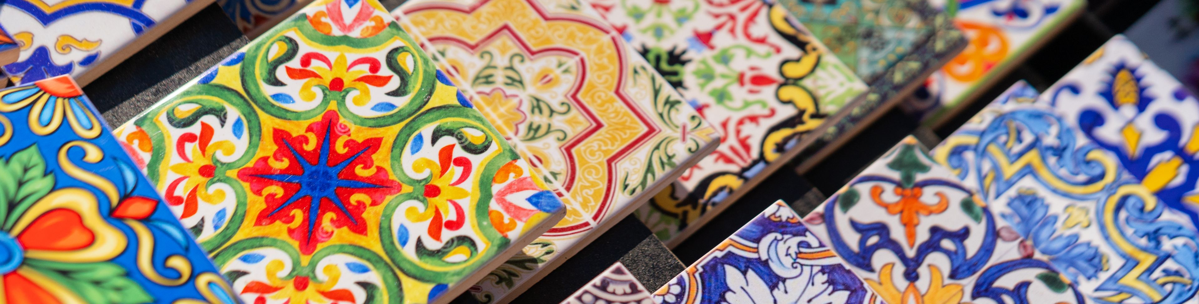 Colorful tiles sit stacked.