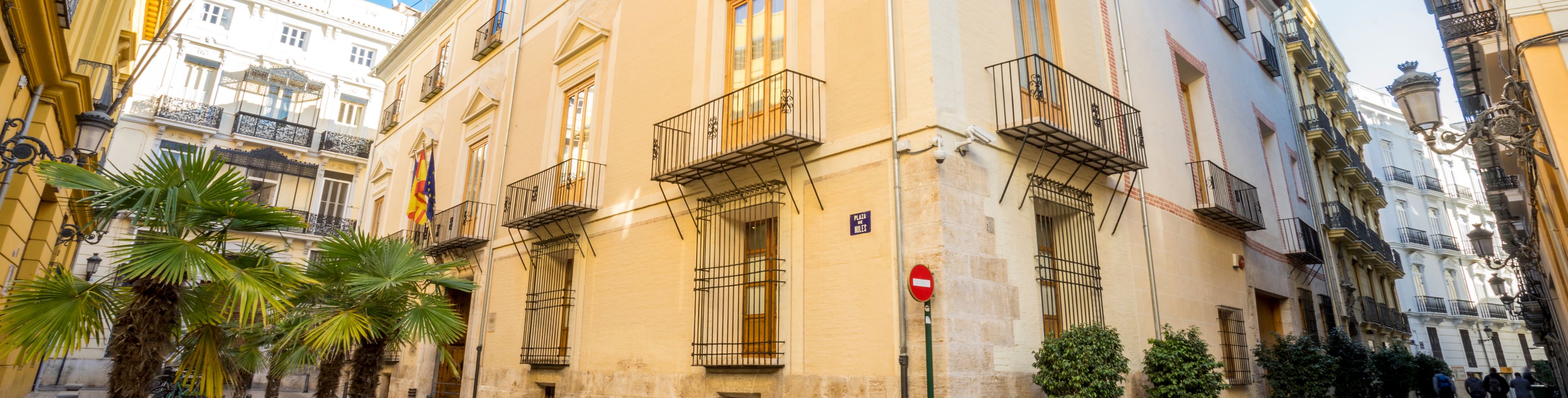 Street view of corner building and street.