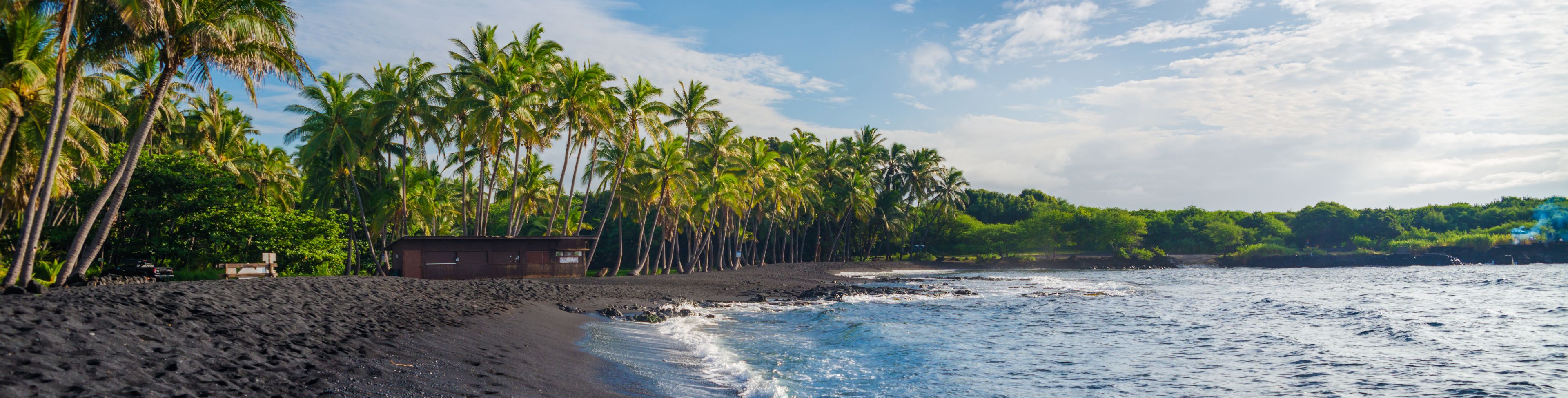 Black sandy beach.