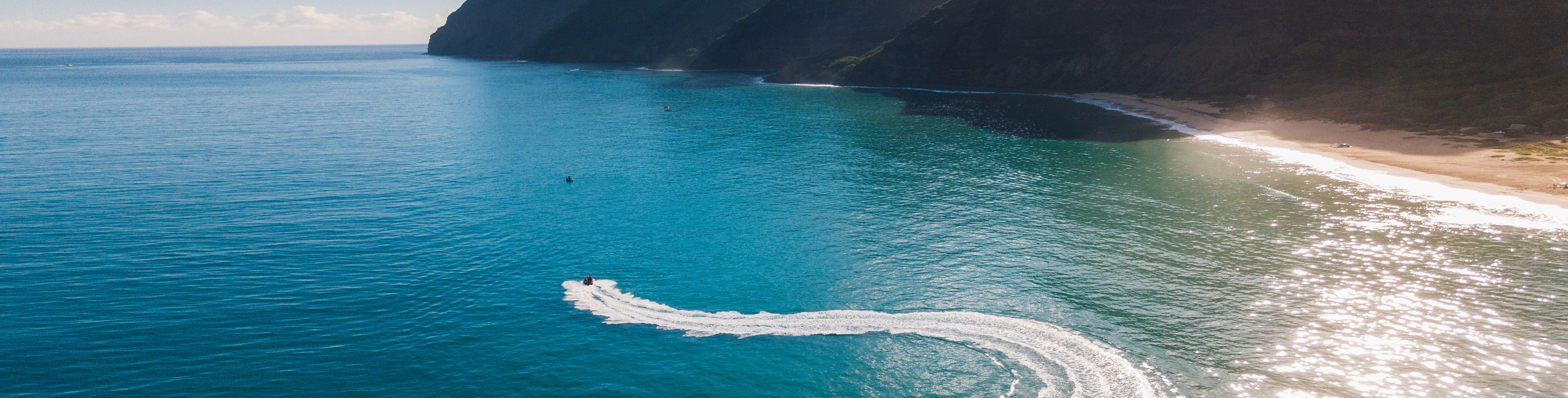 Speed boat boating through the sea.