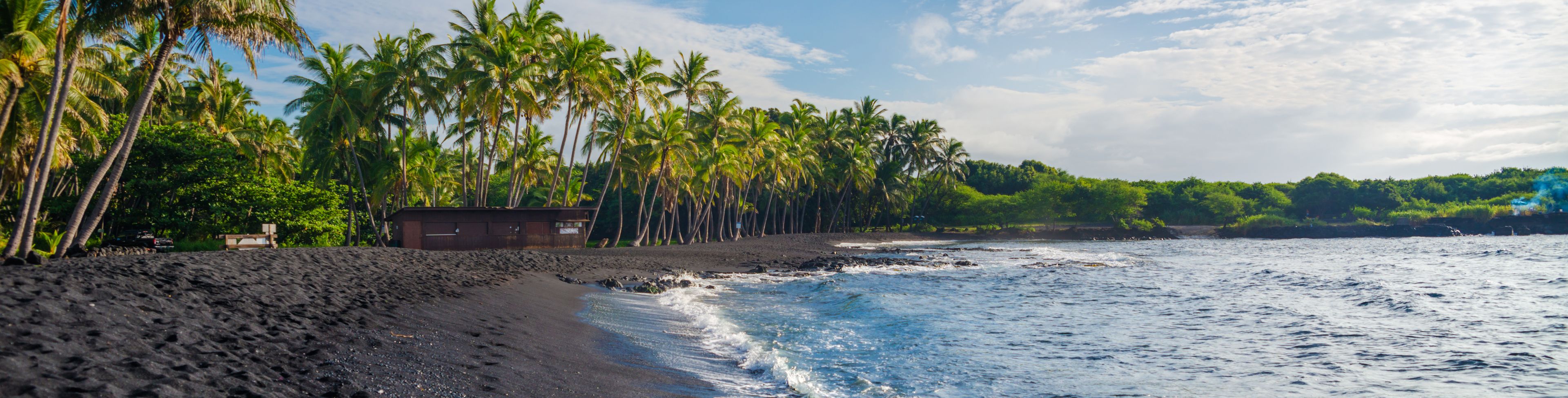 Black sandy beach.